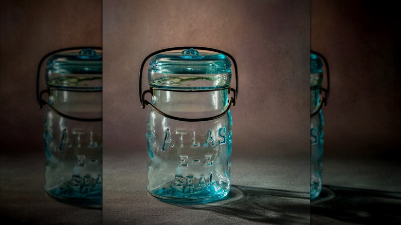 Atlas E-Z seal Mason jar on a brown background.