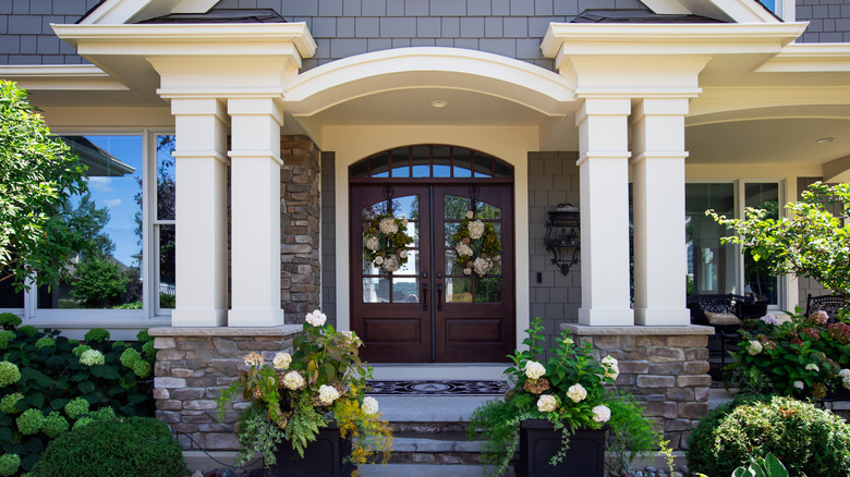 A house with an arch-top transom window over its entryway
