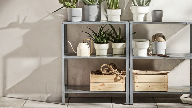 IKEA HYLLIS Shelf Unit on a concrete patio