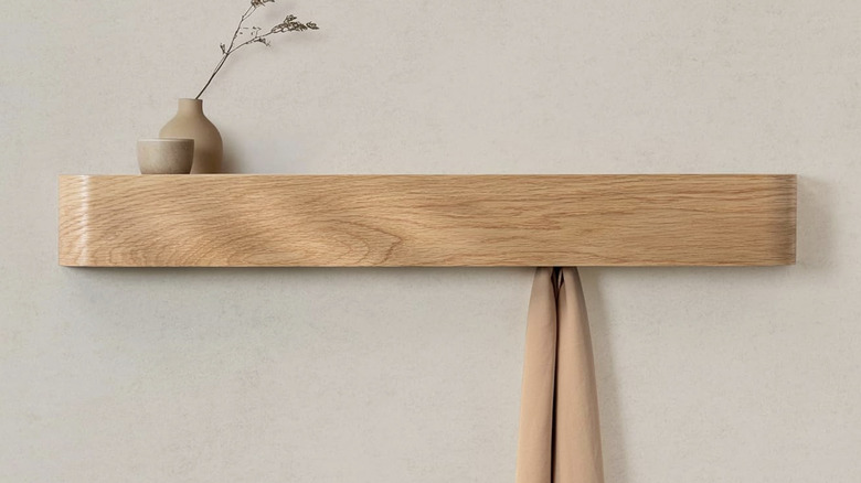 Kazai-brand coat rack with hooks on a wall
