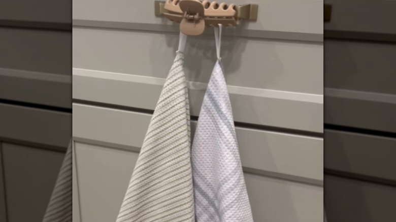 Kitchen towel hack with claw clip