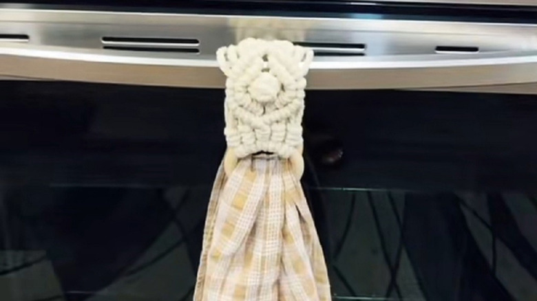 Kitchen towel holder made from macrame