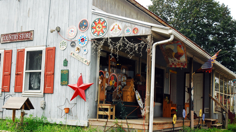 hex signs and a tin star for sale at an antique shop in Reading, Pennsylvania