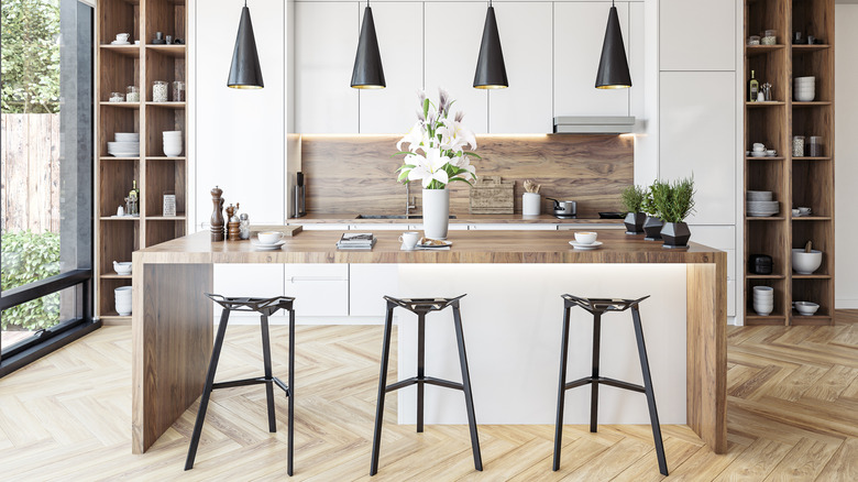 Modern farmhouse kitchen with herringbone floors