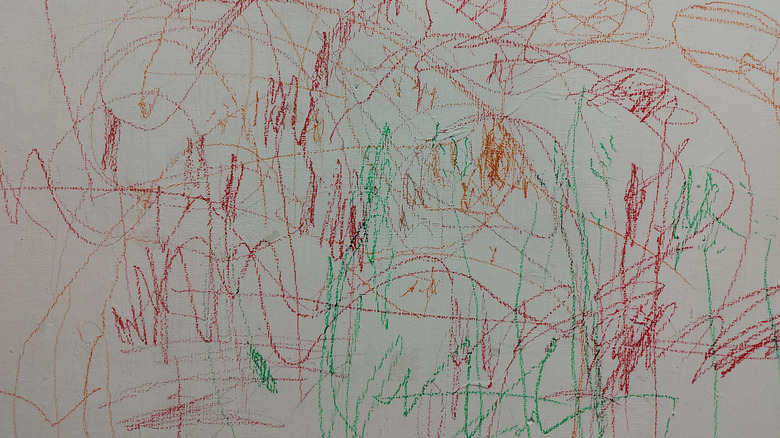 wall with crayon scribbles