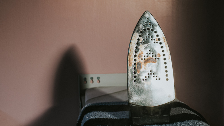 Iron with rust and gunk on the plate