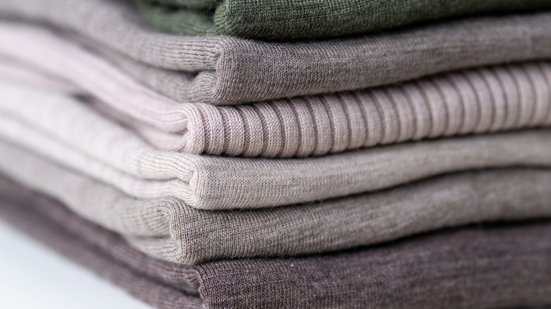Stack of folded wool sweaters