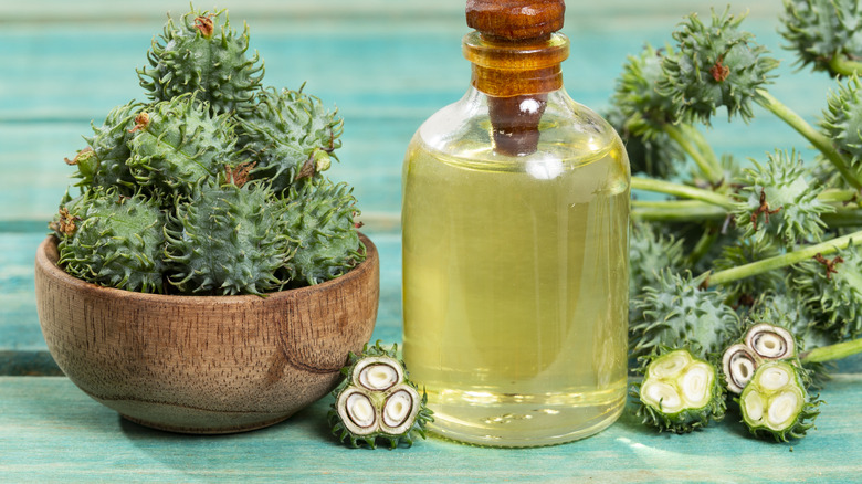 Fruit and castor oil in a bottle.