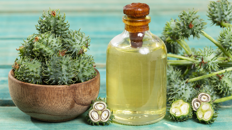 Fruit and castor oil in a bottle.