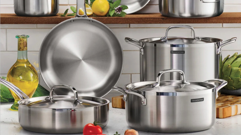 Set of stainless steel Tramontina pots and pans