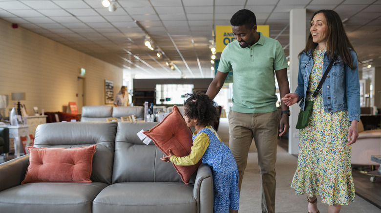 people shopping for sofa