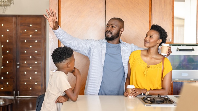 A family discussing a kitchen remodel