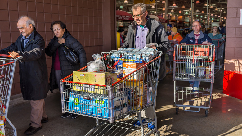 Woman pushing Costco cart