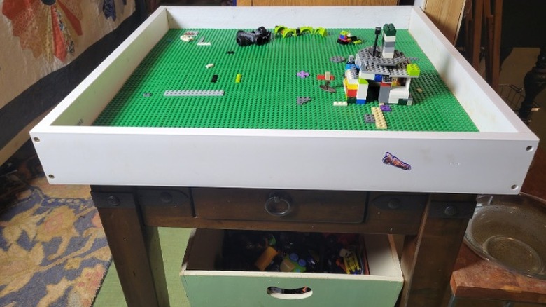 Lego table with closed drawer and a bin underneath