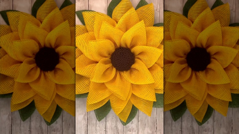 A sunflower wreath made of colored burlap