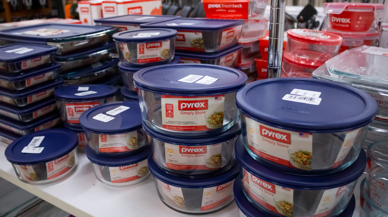 pyrex food containers on a shelf for sale