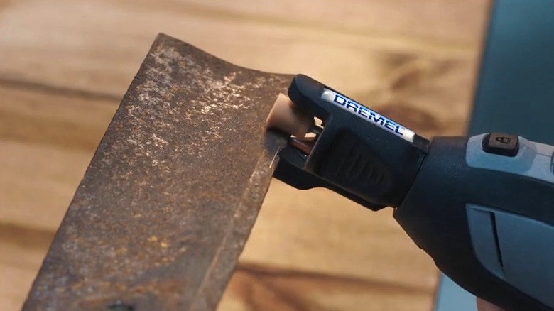 A Dremel 3-Piece Steel Set Grinding/Sharpening Bit Accessory Set is shown in a detail shot