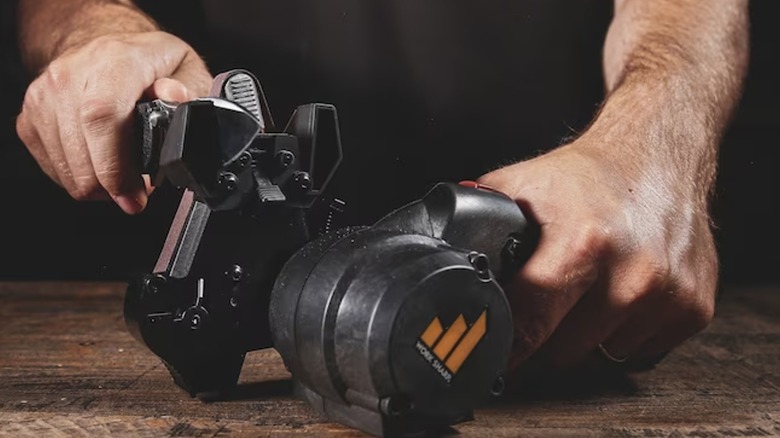 Person opening a Work Sharp Knife & Tool Sharpener