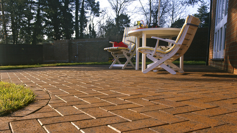 Table and chairs on clay paver patio