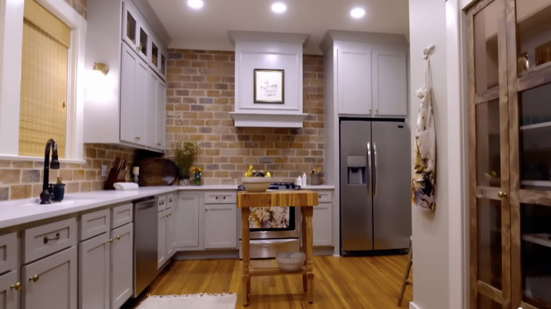 Home Town features a brick kitchen backsplash