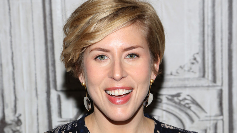 Erin Napier smiling and wearing earrings