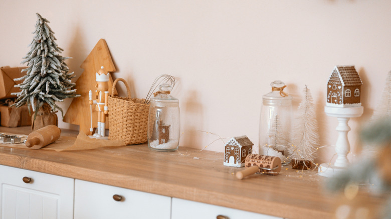 multiple small-sized Christmas decor on kitchen counter