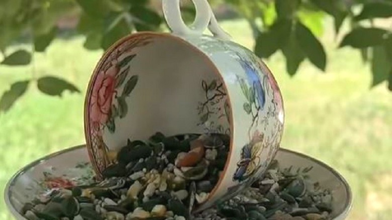 Bird feeder made from vintage teacup