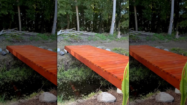 A DIY bridge made from cinder blocks and wood