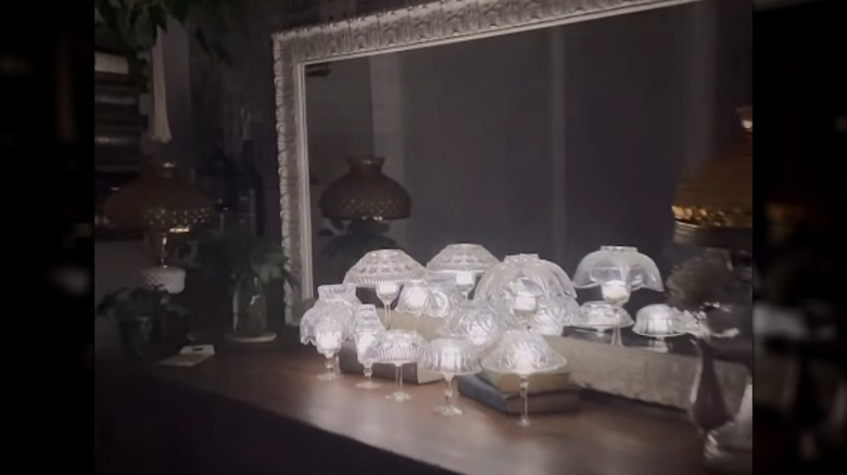 Mini light displays made from wine glasses and upside-down bowls