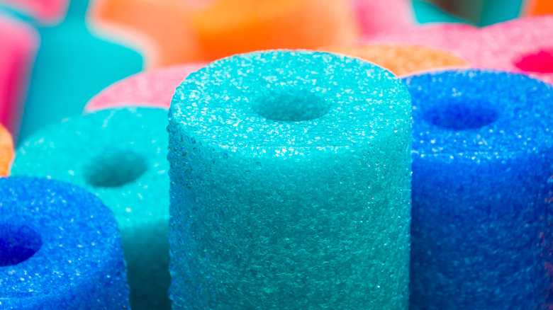 colorful pool noodles up close