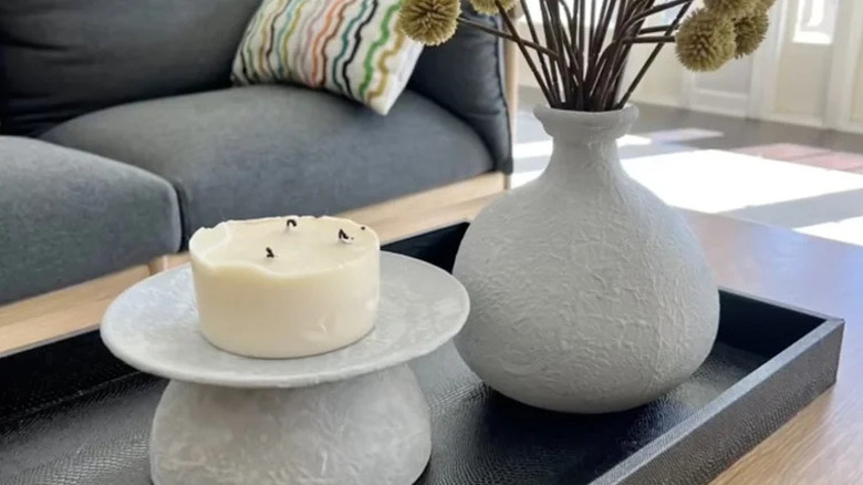 Vase and sculpture made from glassware coated in textural paint