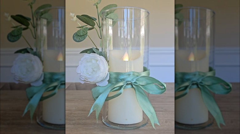 Old vase upcycled into floral candle holder