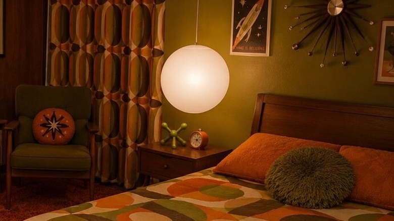 A midcentury modern globe pendant lamp in a funky retro room