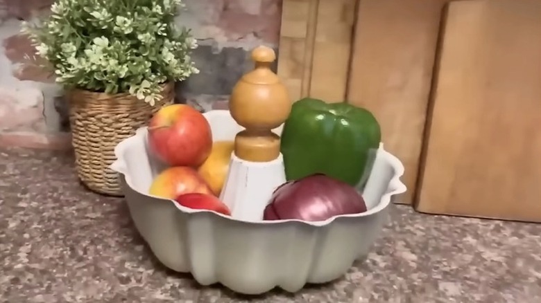 Bundt pan made into bowl with fruit and vegetables inside