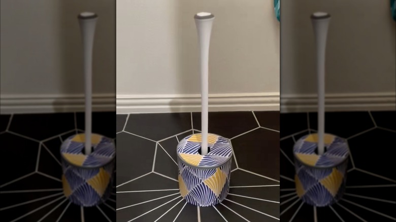 DIY plunger holder in bathroom