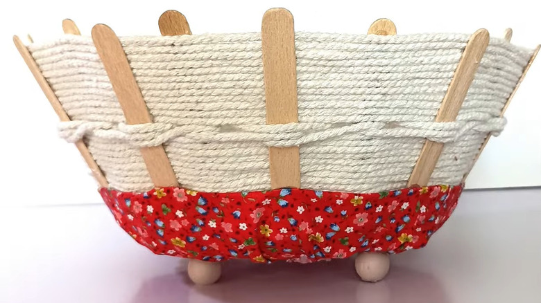 Countertop storage container made with a frying pan as the base with woven sides