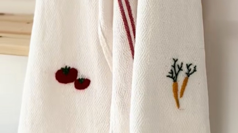 IKEA HILDEGUN dish towels with embroidered tomato and carrot designs