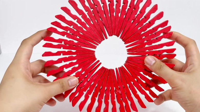 Clothespins turned into DIY countertop trivet