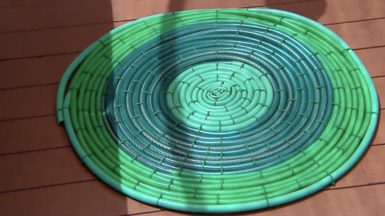 A green DIY garden house outdoor rug