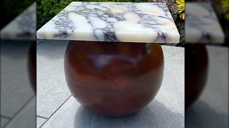 Side table made from two IKEA wood bowls and a slab of marble