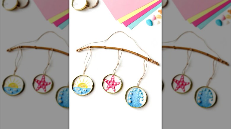 DIY video showing how to paint inside mason jar lids and hang them for outdoor decor