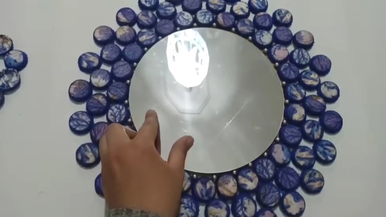 DIY statement mirror made from old bottle caps