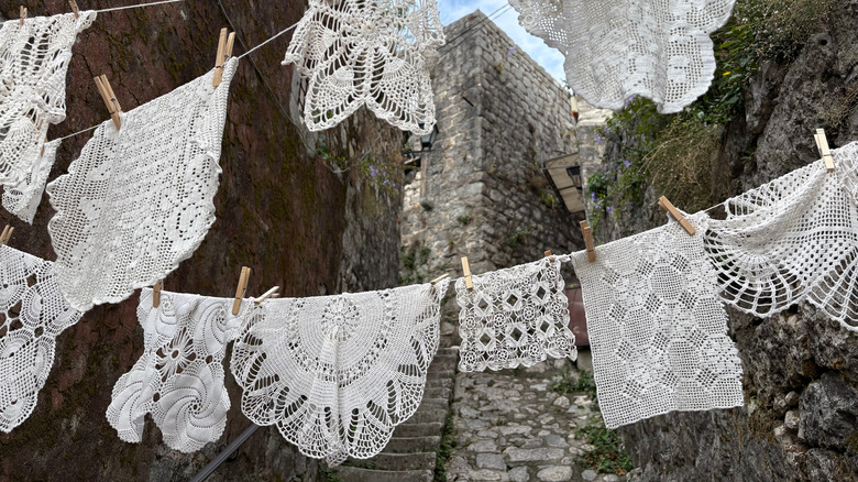 Lace doilies drying on clothesline