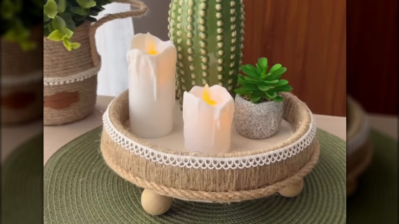 Tray made from the top edge of a bucket with decor inside it