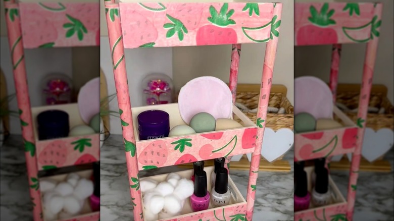 Tiered bathroom countertop tray with a pink patterned exterior