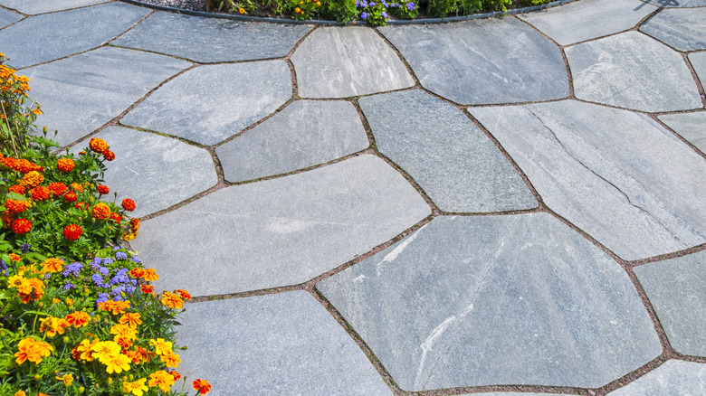 Slate path with flowers.