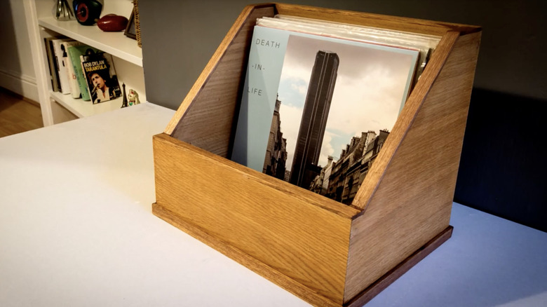 Simple wooden vinyl storage box on a cabinet