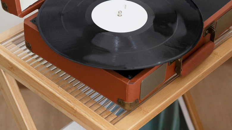 Record player stand with turntable on the top