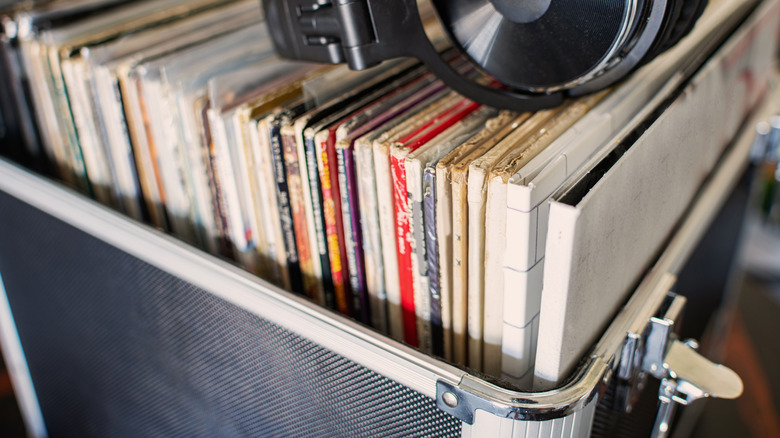 Collection of records sitting in a sturdy metal box