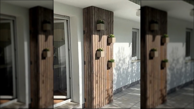 An outdoor storage shelf made from upcycled materials